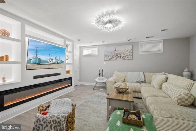 living room with light hardwood / wood-style floors