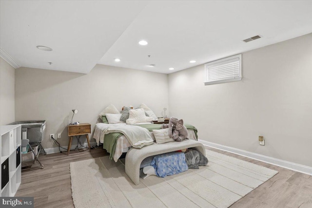 bedroom featuring light hardwood / wood-style floors