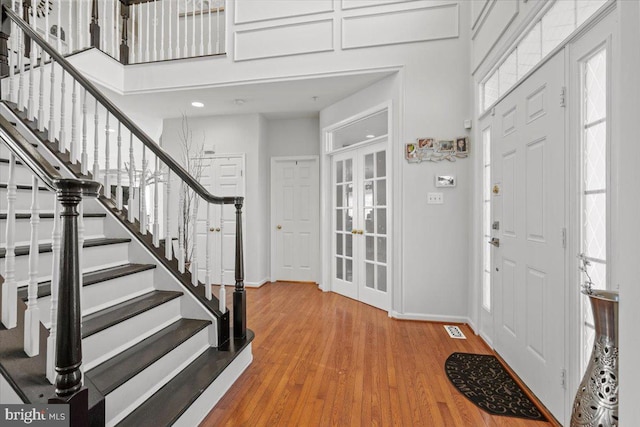 foyer with wood-type flooring