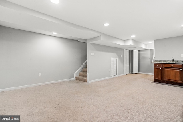 basement with light carpet