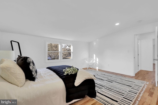 bedroom with light hardwood / wood-style floors