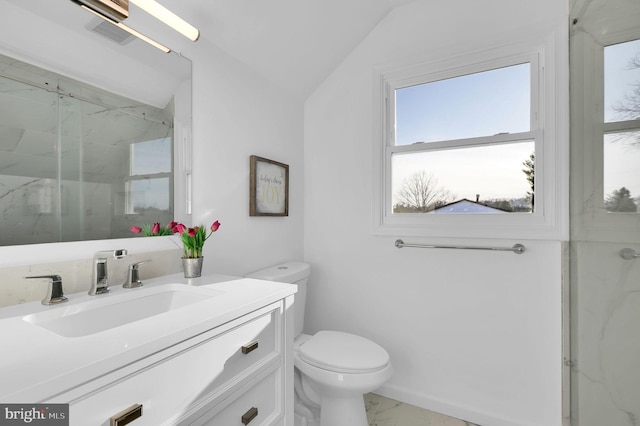 bathroom with vanity, a shower with shower door, lofted ceiling, and toilet