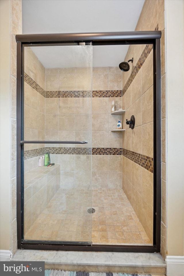 bathroom with an enclosed shower