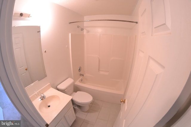 full bathroom with tile patterned floors, bathing tub / shower combination, vanity, and toilet