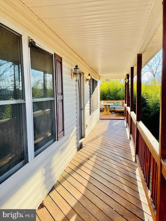 wooden deck with covered porch