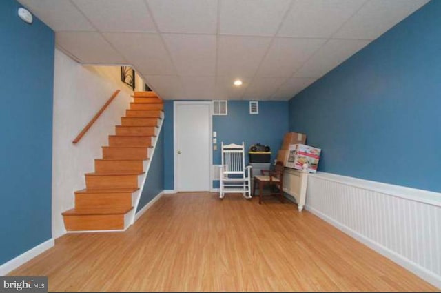 game room with hardwood / wood-style flooring