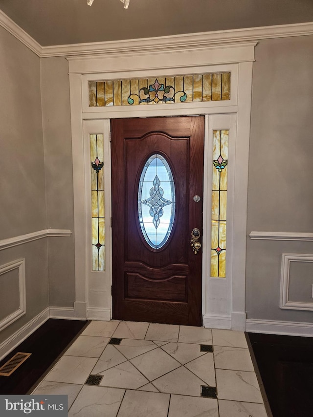 foyer entrance with crown molding