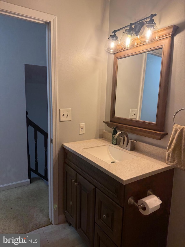 bathroom featuring tile patterned floors and vanity