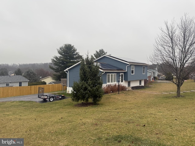 view of property exterior featuring a yard and a patio