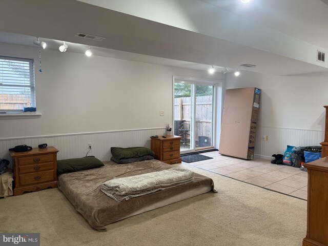 tiled bedroom with wooden walls