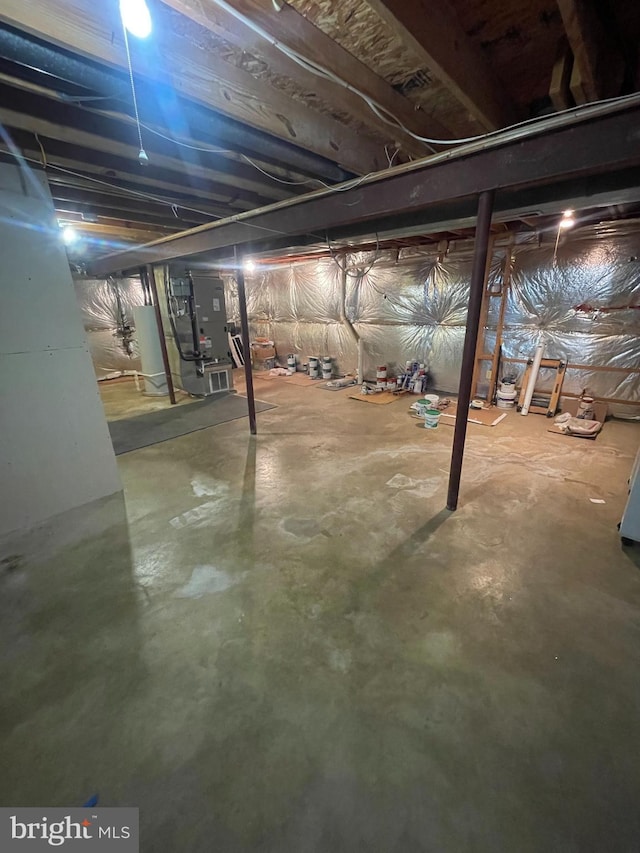 basement featuring heating unit