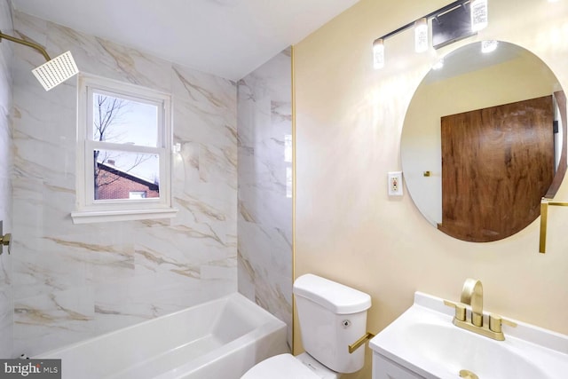 full bathroom with vanity, toilet, and tiled shower / bath combo