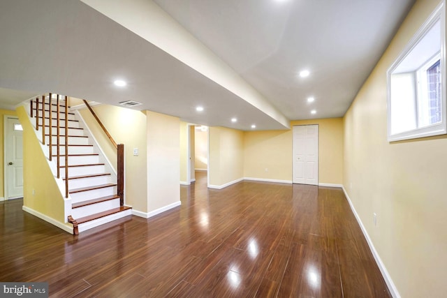 basement featuring dark wood-type flooring