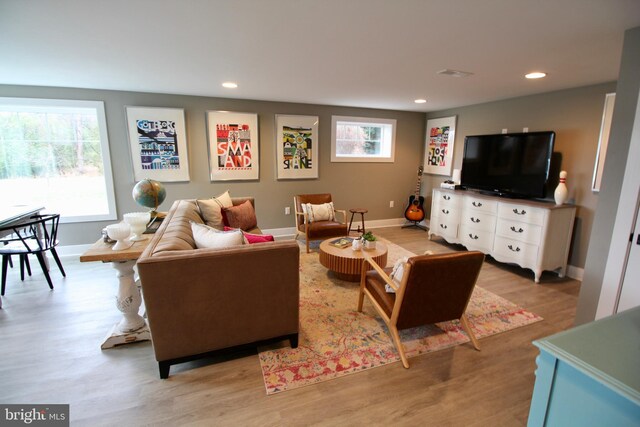 living room featuring light wood-type flooring