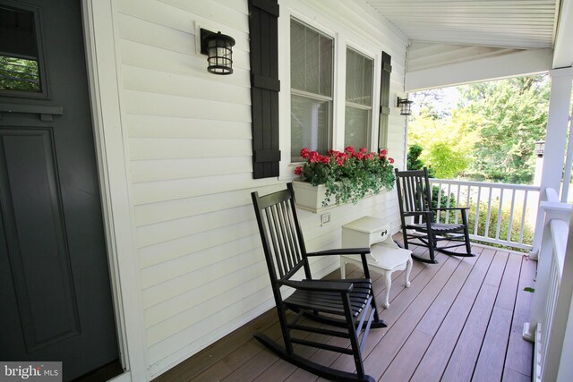 deck featuring covered porch