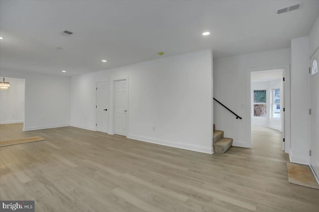 unfurnished room with light hardwood / wood-style flooring