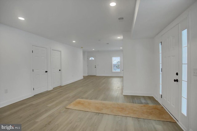 foyer with light hardwood / wood-style flooring