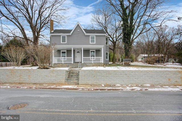 view of property with a porch