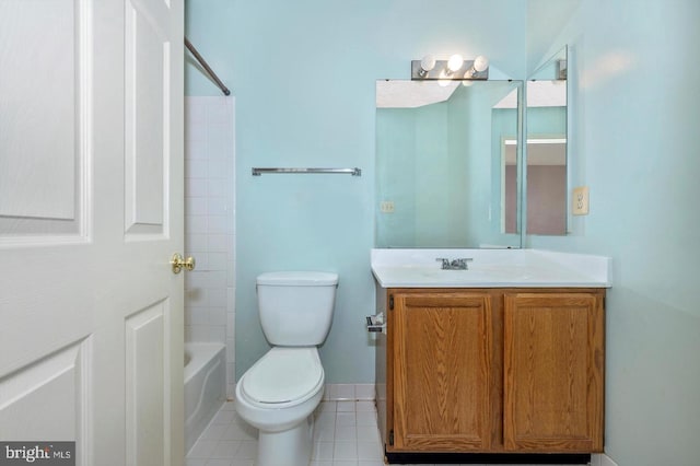 full bathroom featuring tile patterned flooring, vanity, toilet, and bathtub / shower combination