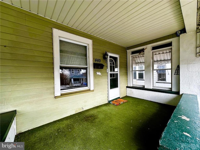 entrance to property with covered porch