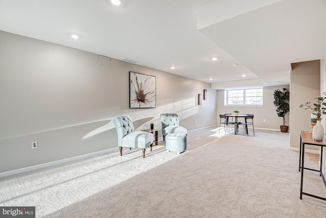 sitting room featuring carpet