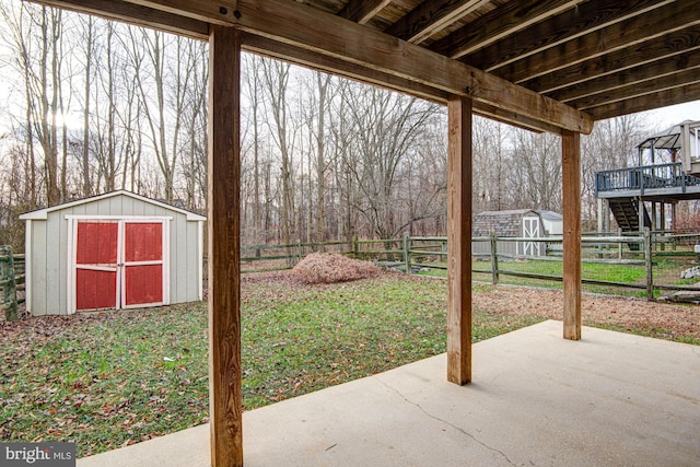 view of patio with a shed