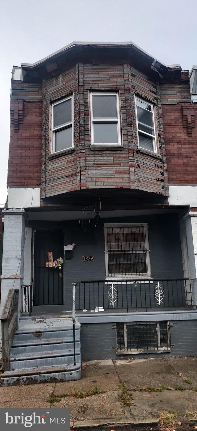 view of home's exterior featuring covered porch