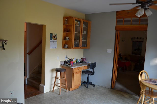 kitchen featuring ceiling fan