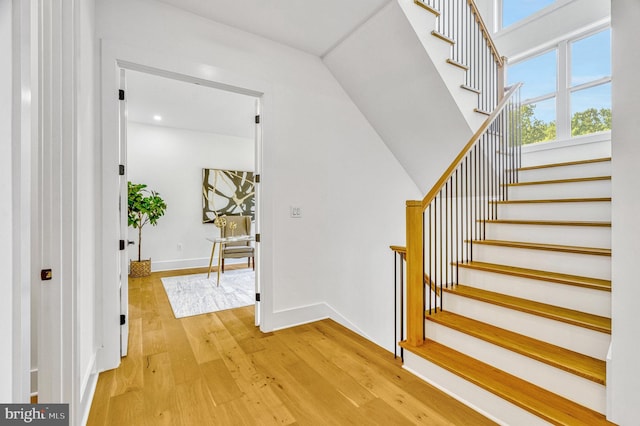 stairway with wood-type flooring