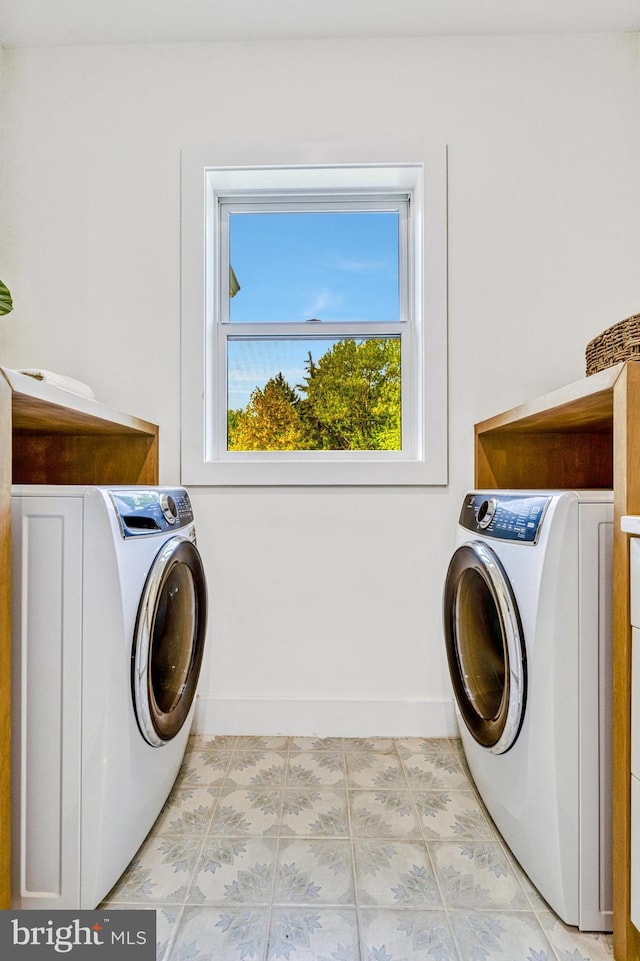 laundry area with light tile patterned flooring