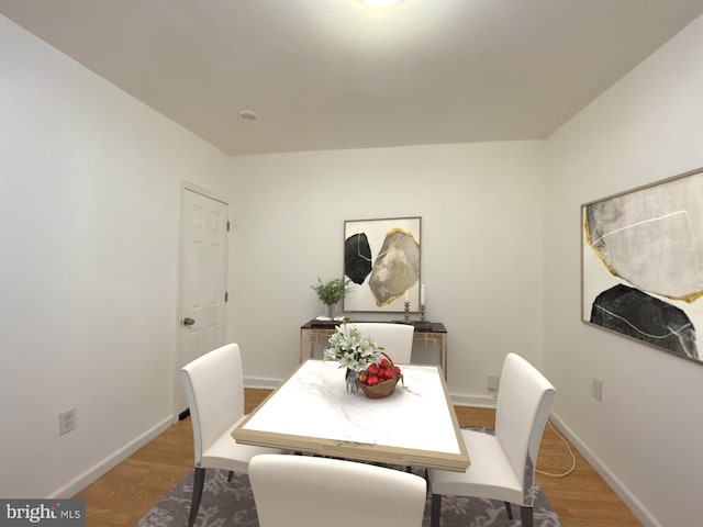 dining room featuring wood-type flooring