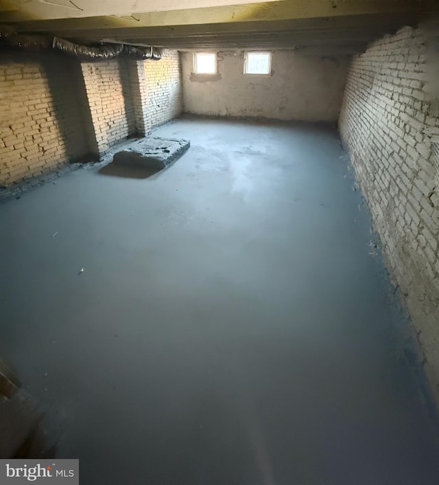 1103 N Carrollton Ave, Baltimore, MD 21217 - basement featuring brick wall and oil tank
