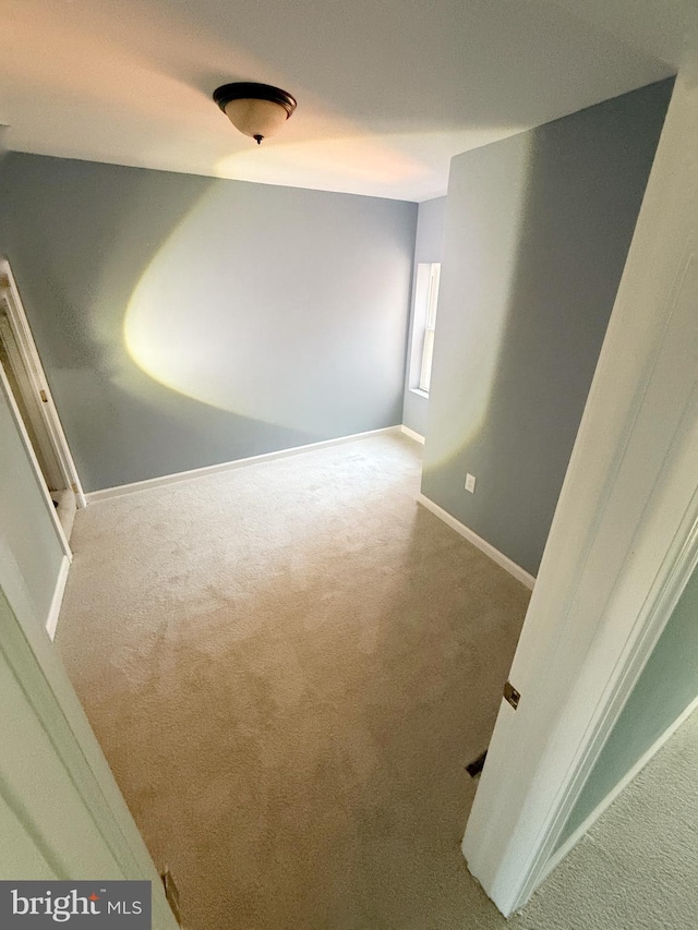 spare room with carpet flooring