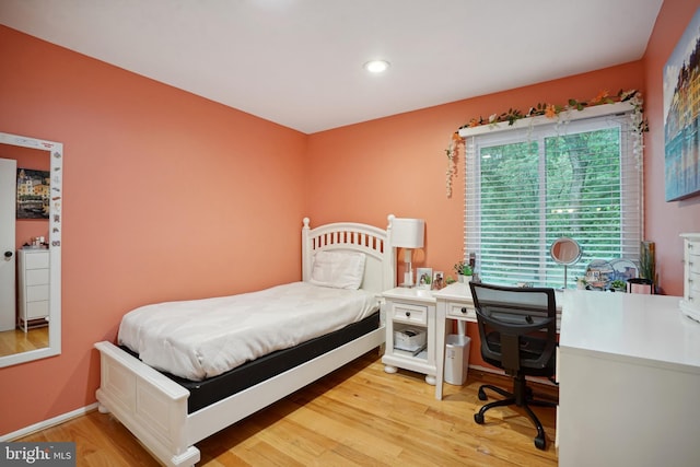 bedroom featuring light hardwood / wood-style floors