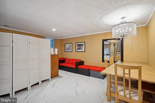 living room featuring a chandelier and crown molding