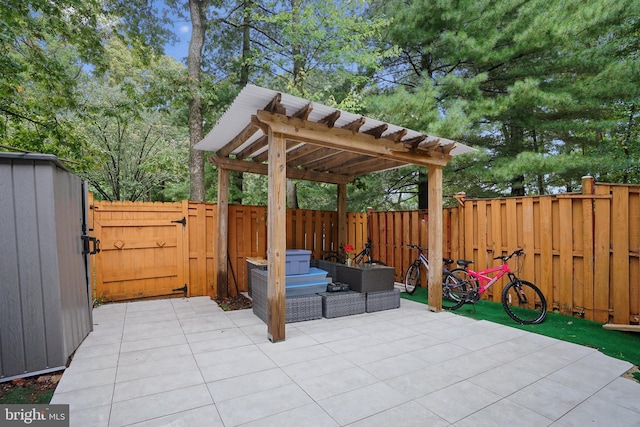 view of patio featuring an outdoor living space and a pergola