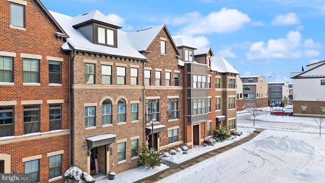 view of snow covered property