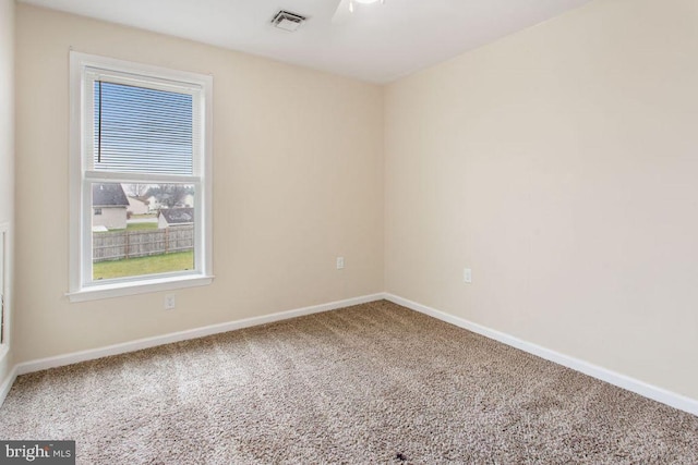 unfurnished room with carpet floors