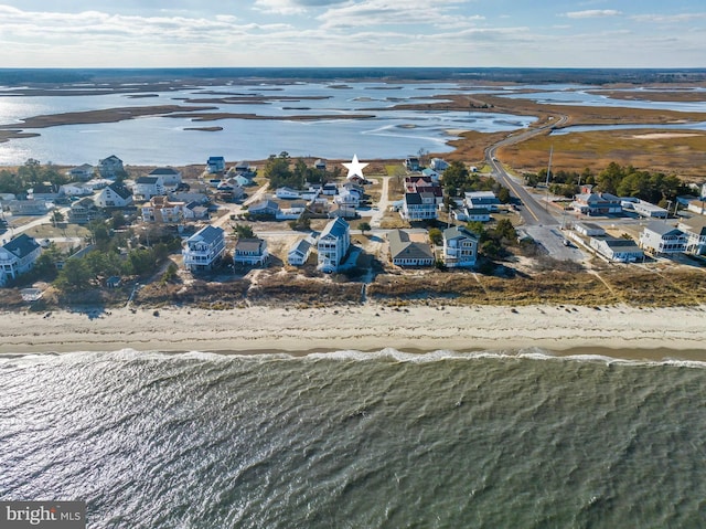 aerial view featuring a beach view and a water view