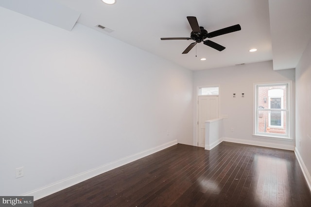 interior space featuring ceiling fan and dark hardwood / wood-style flooring