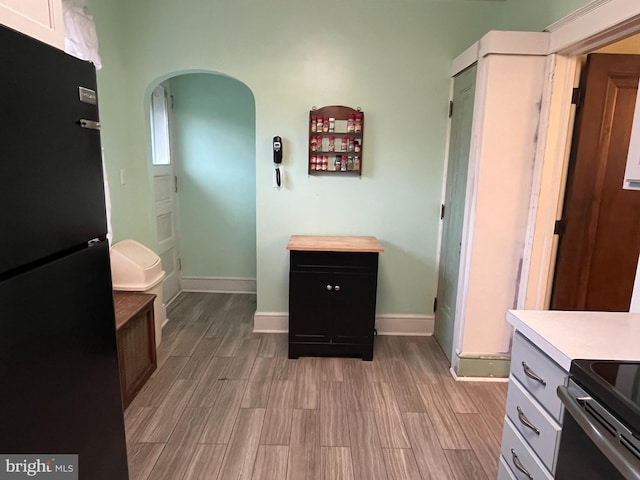 bathroom with wood-type flooring