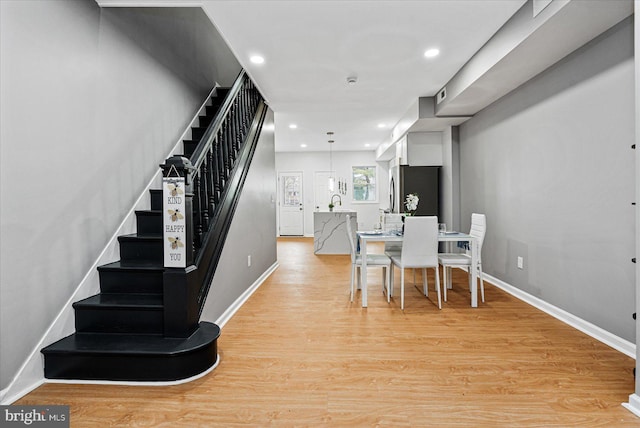 dining room featuring light hardwood / wood-style floors