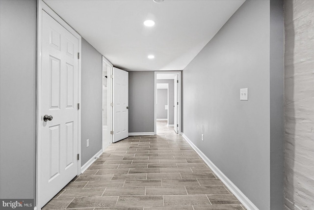 hall with light wood-type flooring