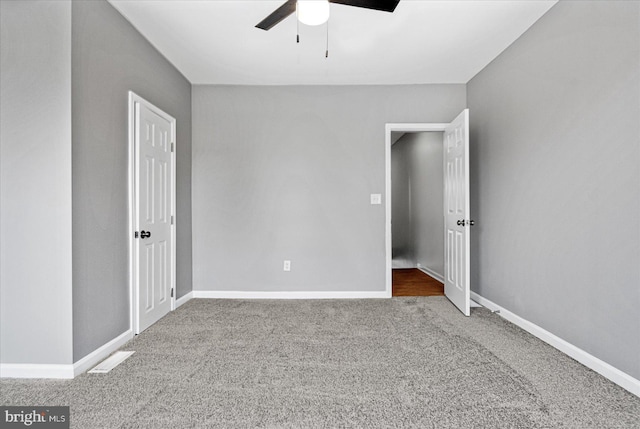 unfurnished bedroom with carpet and ceiling fan