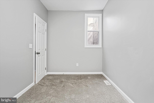 spare room with carpet flooring