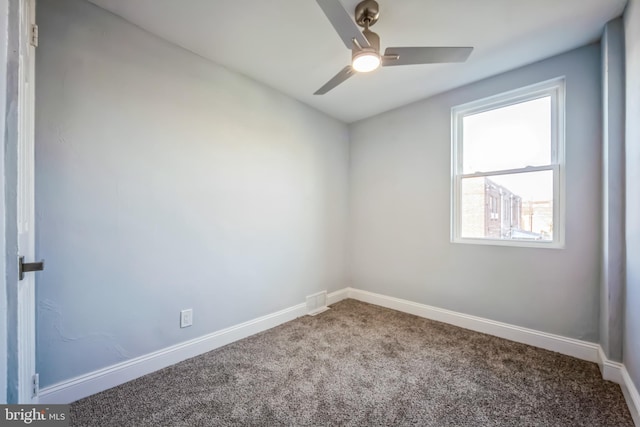 empty room with carpet flooring and ceiling fan