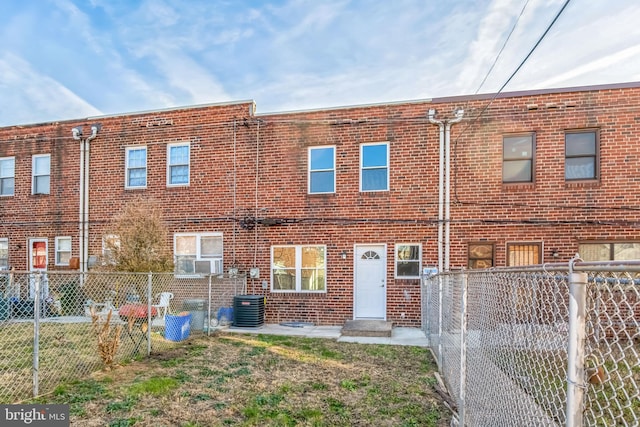 view of front of home featuring central AC unit