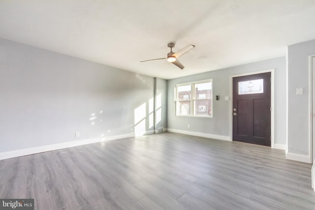 entrance foyer with hardwood / wood-style flooring and ceiling fan