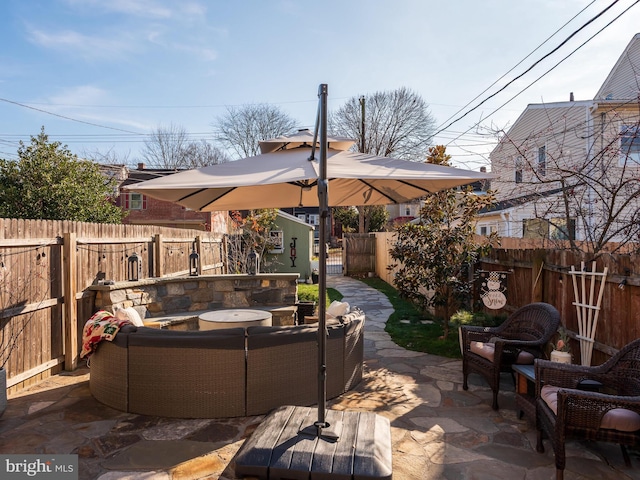 view of patio featuring an outbuilding and an outdoor hangout area