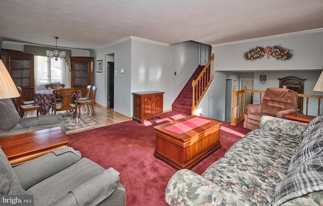 living room with light hardwood / wood-style flooring, an inviting chandelier, and crown molding